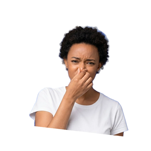 Woman pinching her nose with her hand on a white background